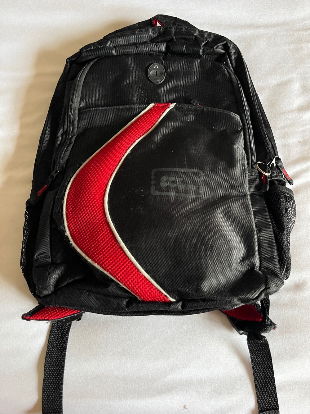 Black & Red Multi-Pocket Backpack with Media Port & Mesh Side Pockets